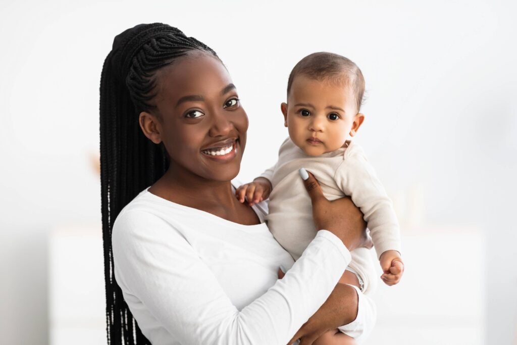 african-american-mom-hugging-her-cute-infant-and-p-2025-03-18-18-31-36-utc (1)